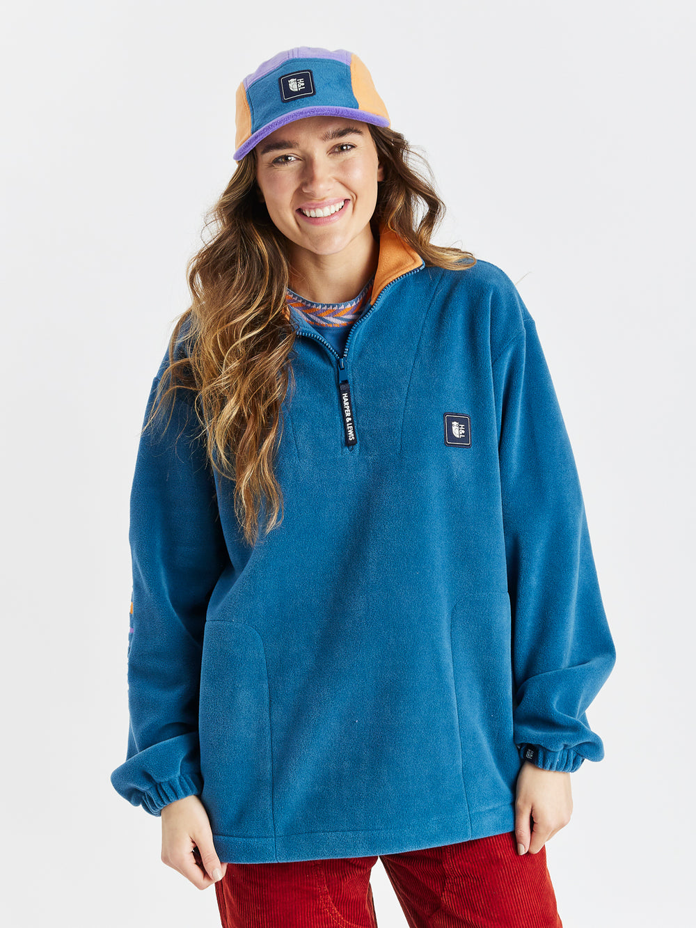 Oversized Quarter Zip Retro Fleece with two side pockets and a drawcord hem.
