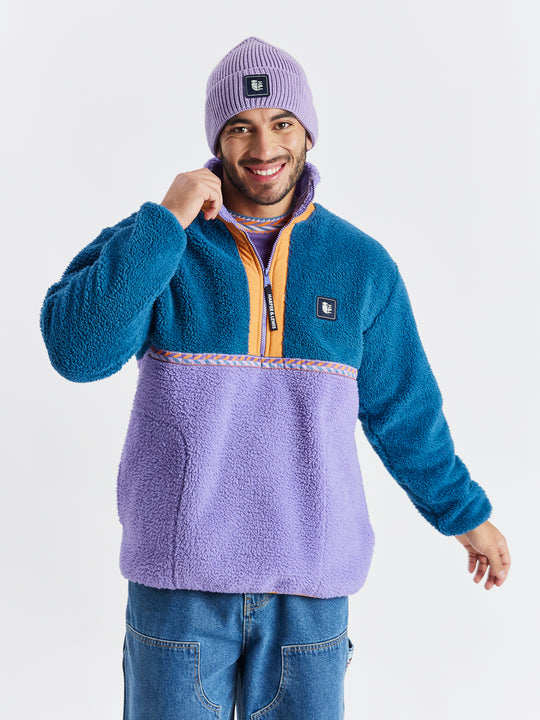 Teddy style fleece, with Petrol, Deep Lavender, and Apricot accents, perfect for colder months.
