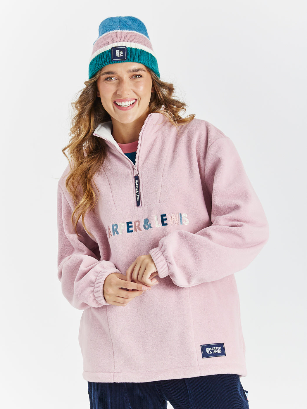 Eirwen 1/4 rits fleece stof roze