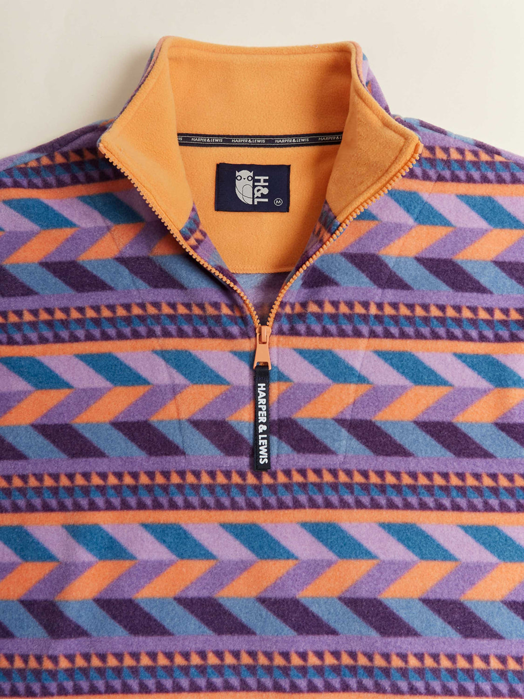 Men's fleece jacket a classic Pattern and a contrasting Apricot inside colour.