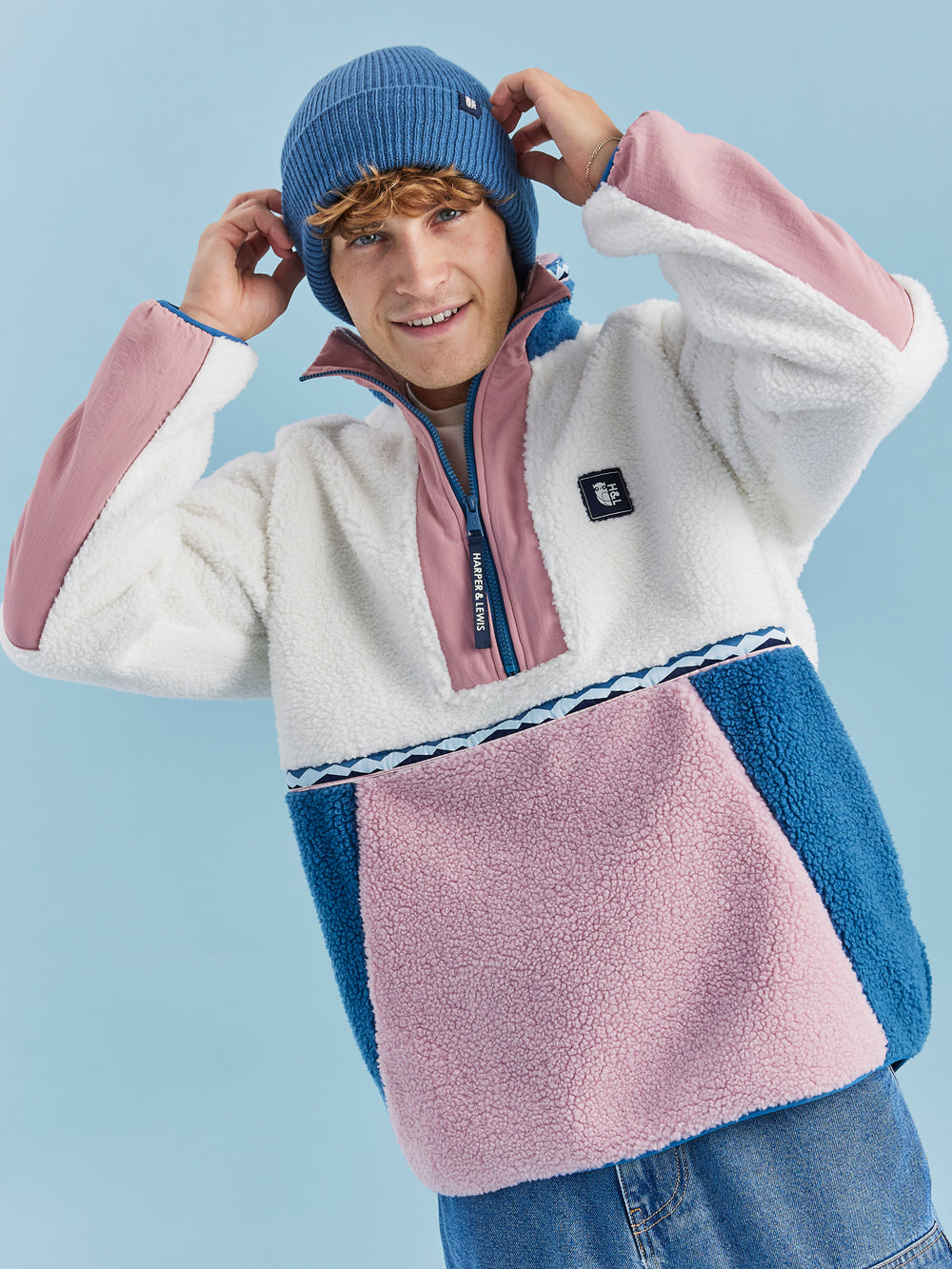 Unisex Sherpa style fleece with Dusty Pink crinkle woven plackets on the sleeves and along the 1/4 zip.