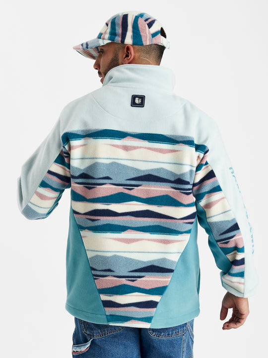 Vintage inspired 1/4 zip fleece, the top half of the fleece is light blue  with our mountain print in the middle and the bottom half is a steel blue colour with a contrasting collar.
