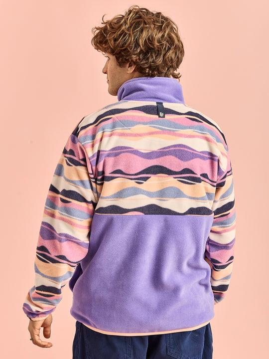 Back shot of the Unisex fleece. Showing the Half pattern, Half Deep Lavender.