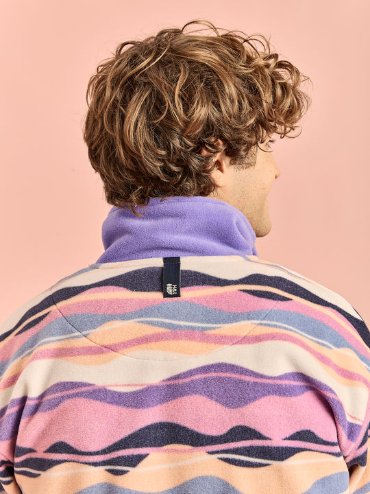 Back neck detail showing the navy hanging patch.