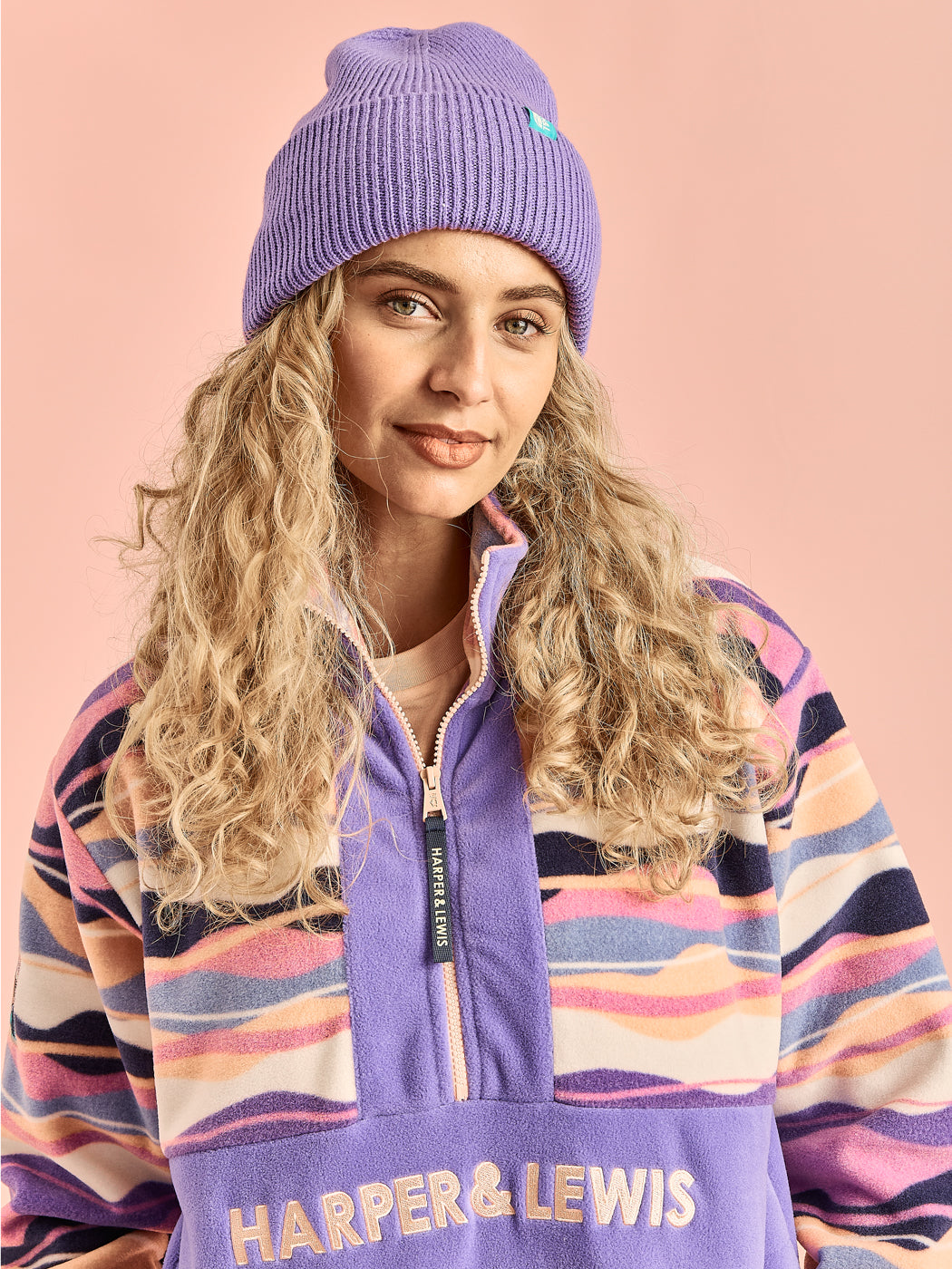 Female Model wearing The Bodie Mountain Pattern Fleece, which is made from 100% Polyester.