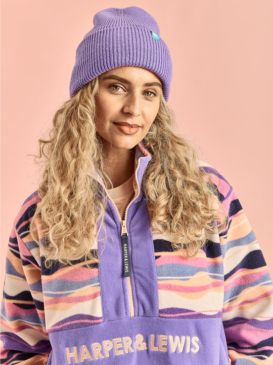 Female Model wearing The Bodie Mountain Pattern Fleece, which is made from 100% Polyester.
