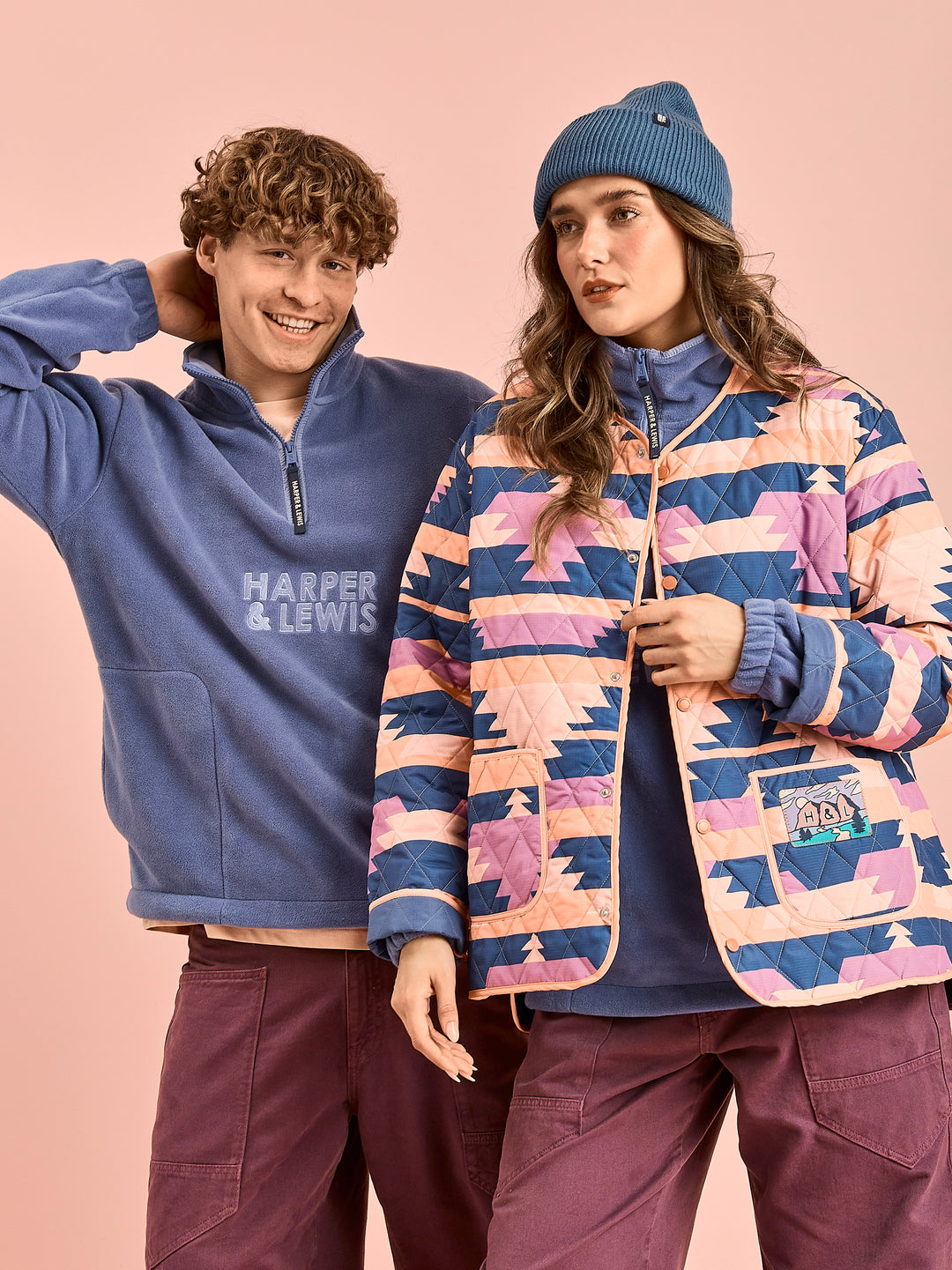 Both Models wearing the unisex fleece jacket, which as been layered with a quilted jacket.
