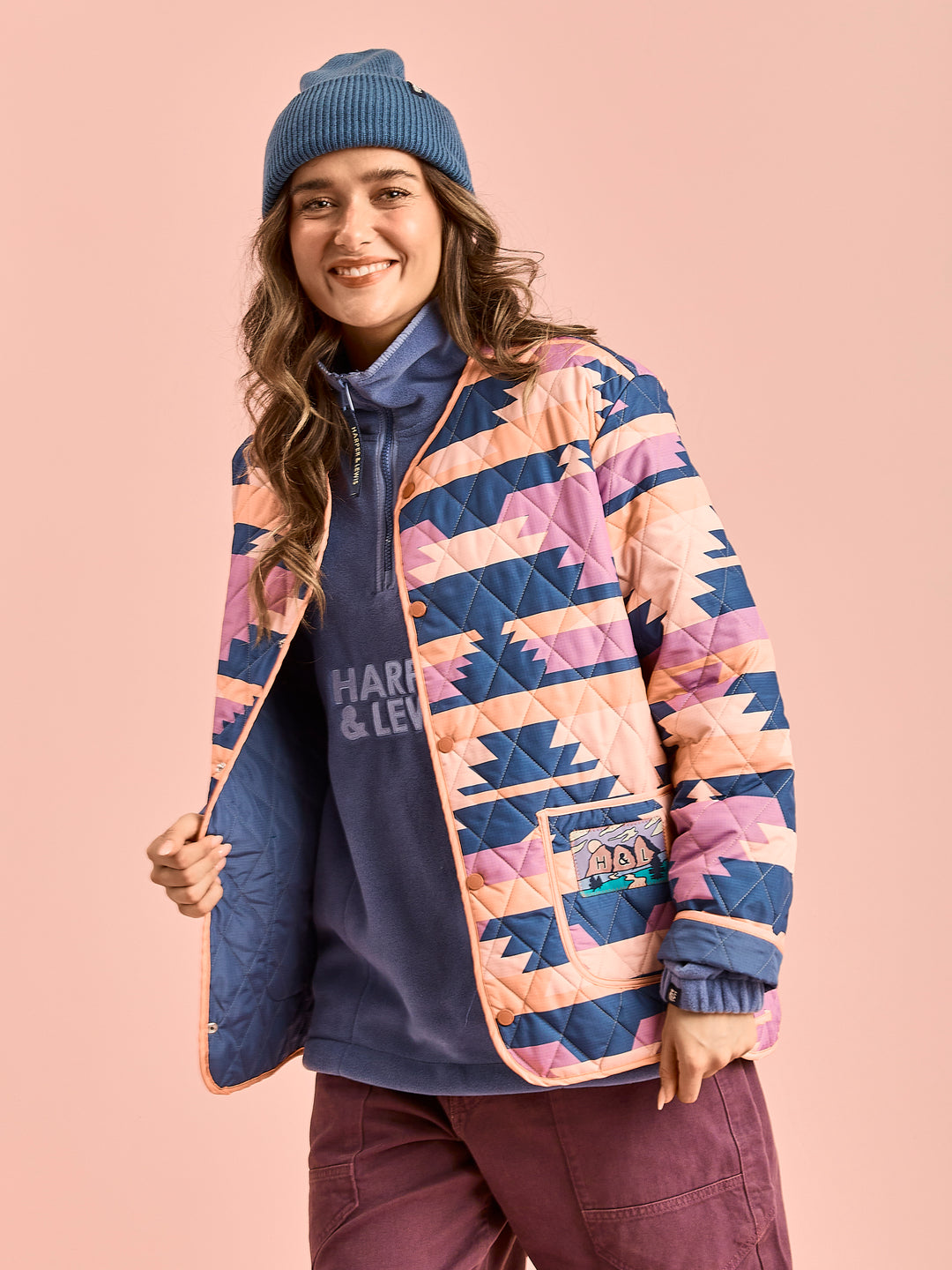 The Elsa quarter zip Fleece layered with the Zinnia Quilted Jacket.