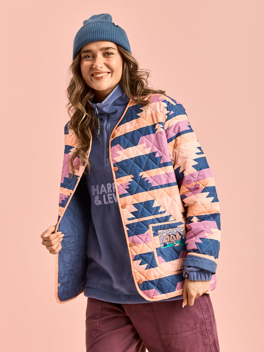The Elsa quarter zip Fleece layered with the Zinnia Quilted Jacket.