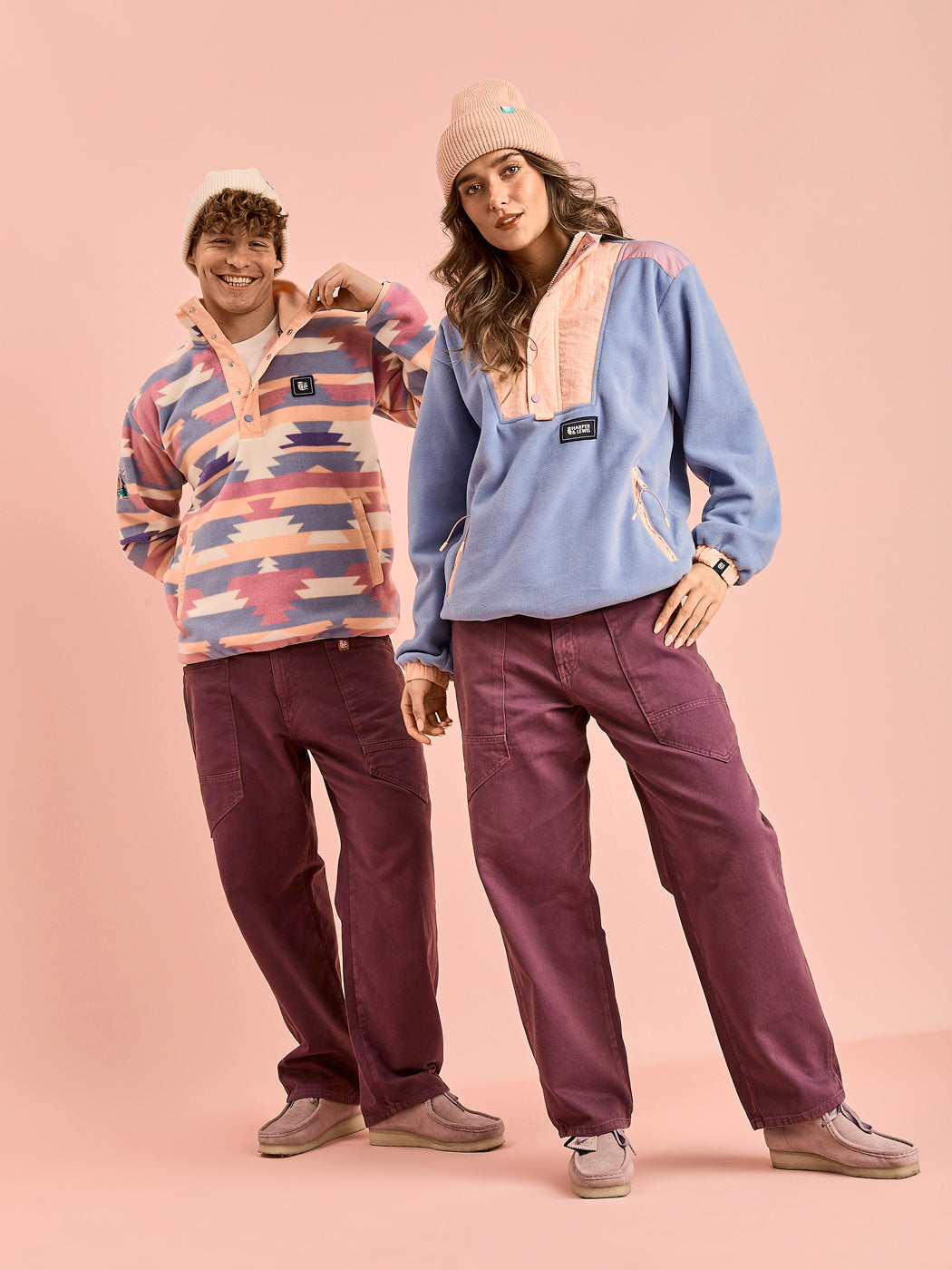 Both models wearing fleeces from our latest collection which is in the softer colours of the season