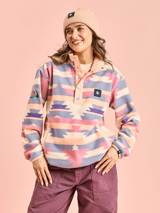 Female Model wears the Tallow fleece in Tribal Pattern in Peach