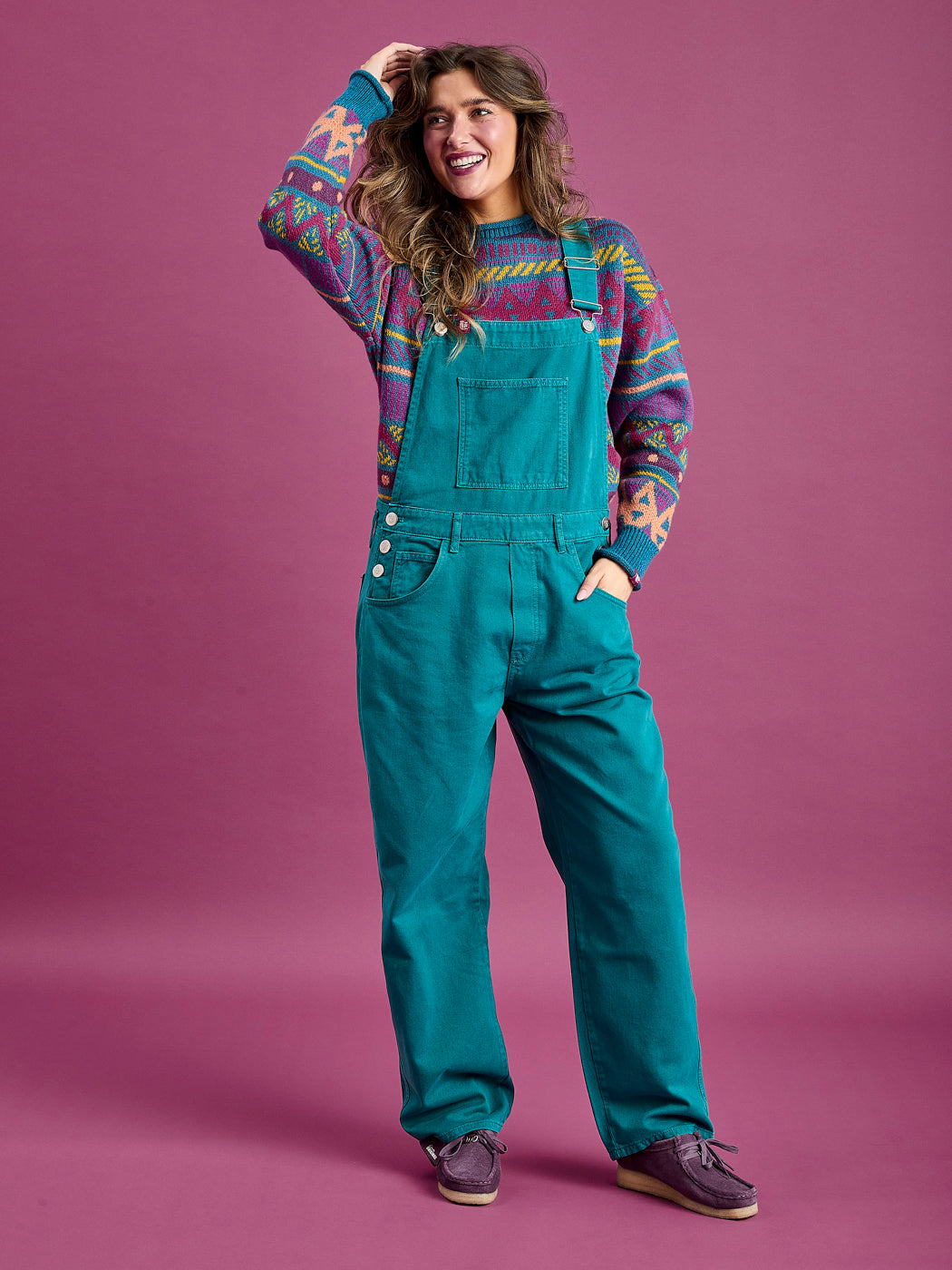 Female Model wearing the Aria Dungarees in Teal