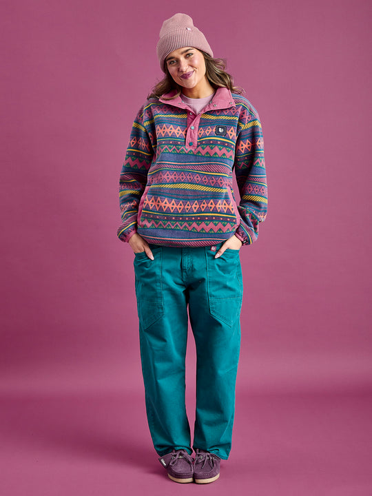 Female Model wears the aztec unisex fleece with contrasting dark rose plackets