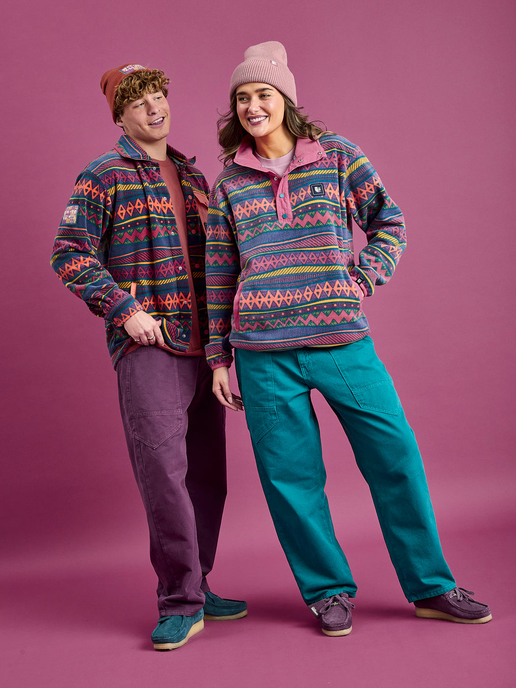 Female model wears the Tallow fleece jacket styled with the Asani Trousers in Teal