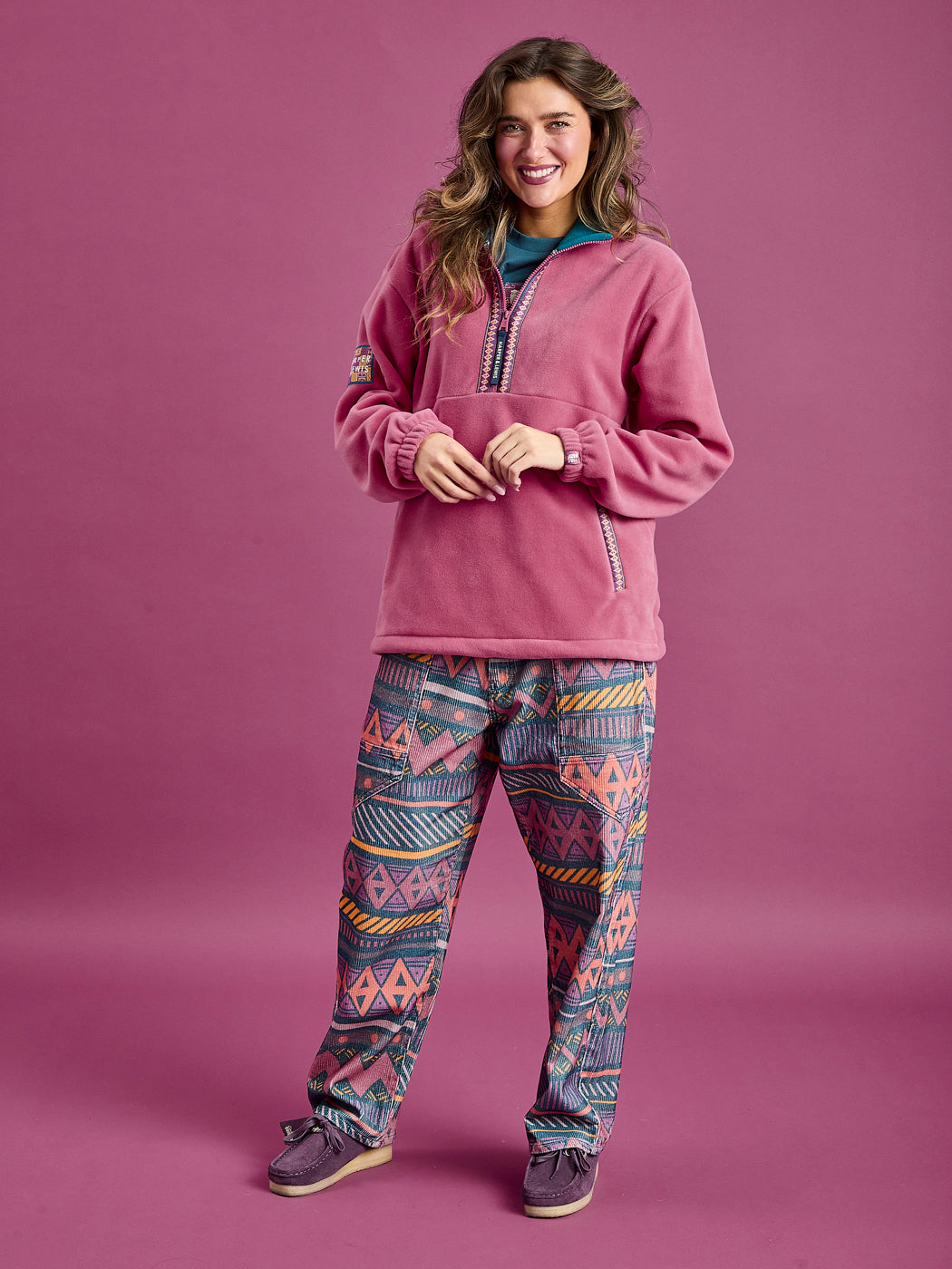 Crafted from Corduroy in the eye-catching Aztec Wave Pattern, which features shades of Dark Rose, Mustard, Deep Mulberry, Orchid, Teal & Deep Peach.