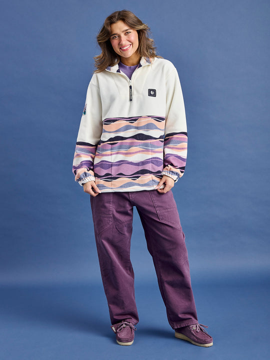 This 1/4 Zip polar fleece is designed with a new updated true to size fit for relaxed layering.