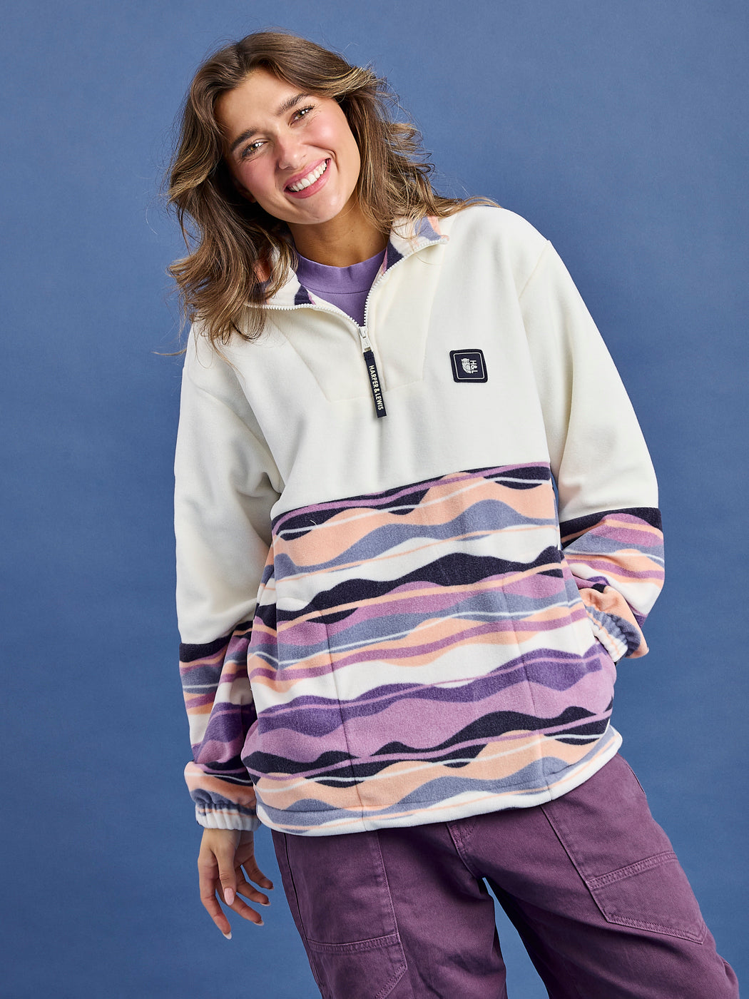 Female Model wearing the Bronte fleece in the winter print, Mountain Wave.