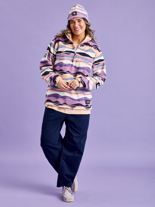 This fleece brings both exceptional warmth and a distinctive aesthetic to your wardrobe, perfect for this winter season.