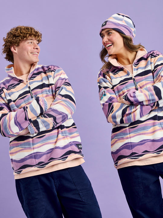 Both models wearing the New Updated Raver Fleece in the Mountain wave design.