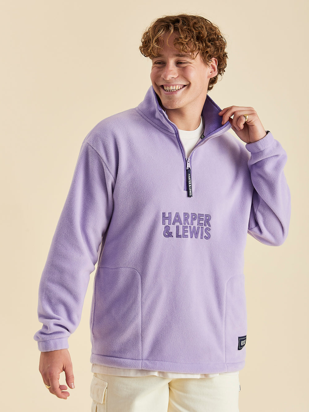 Harper & Lewis Elsa 1/4 Zip Fleece, features a Harper & Lewis stacked embroidered design. 
