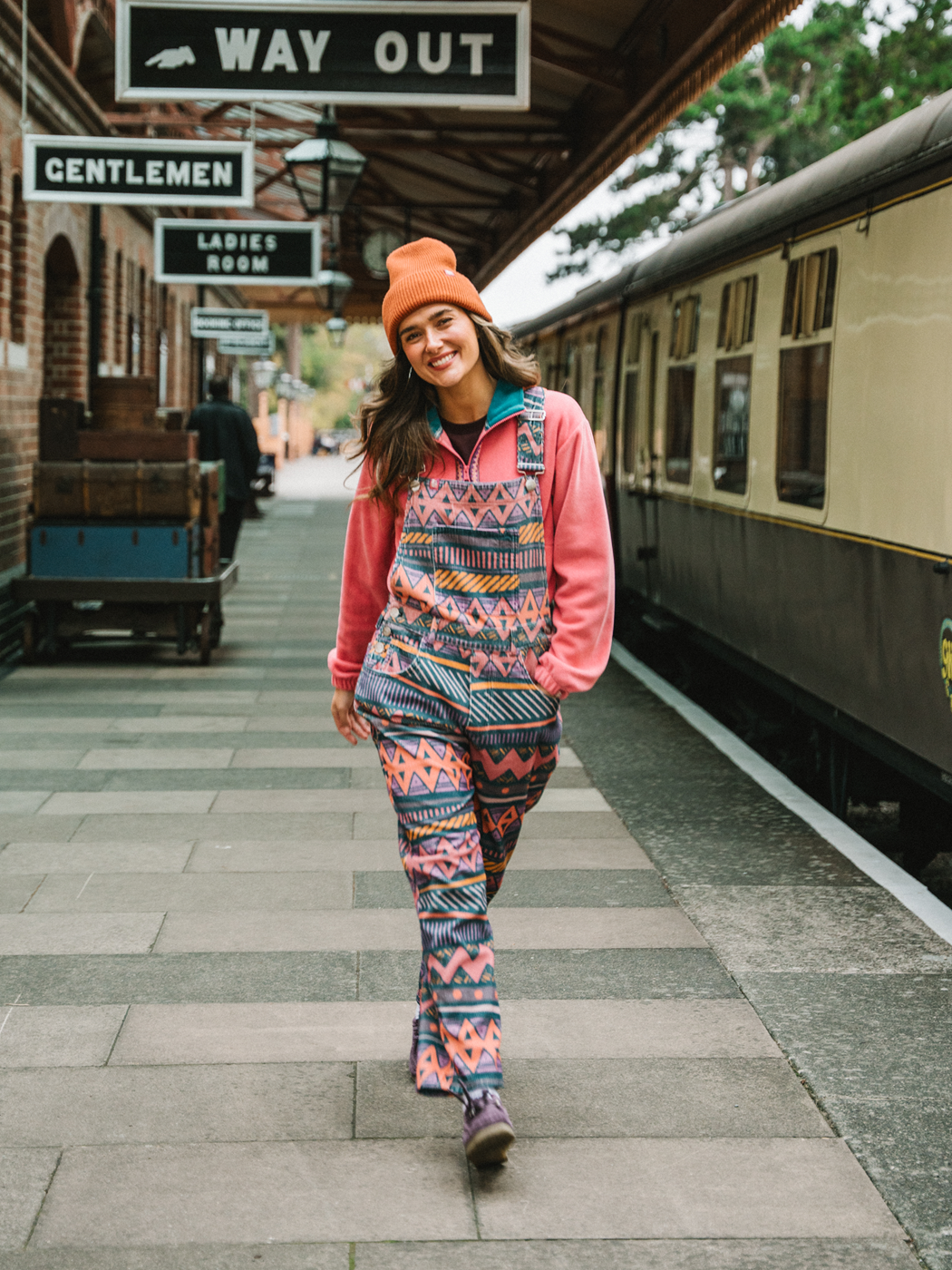 Female model wears the Lois Aztec Wave patterned corduroy dungarees 